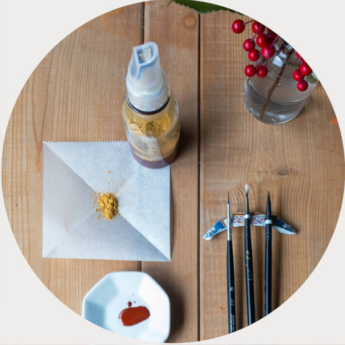 Kintsugi jewelry tools. Urushi (Japanese Lacquer), bronze powder and thin brush